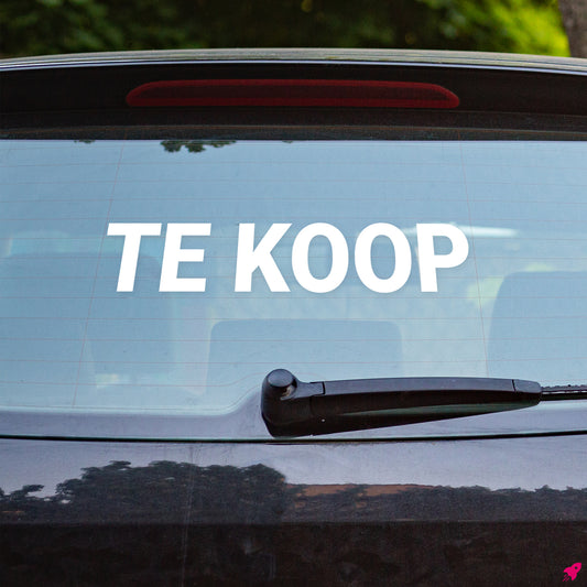 Witte TE KOOP sticker op autoruit